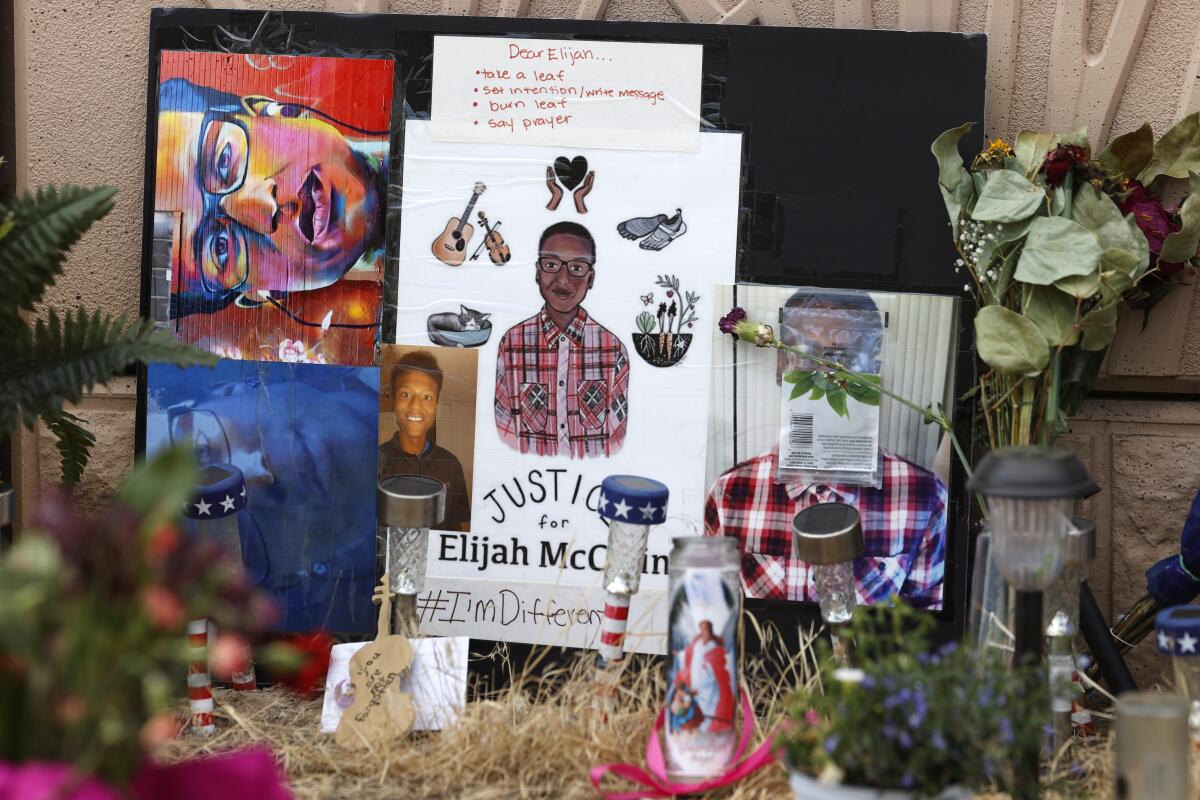 A makeshift memorial stands at a site across the street from where Elijah McClain was stopped by police officers.