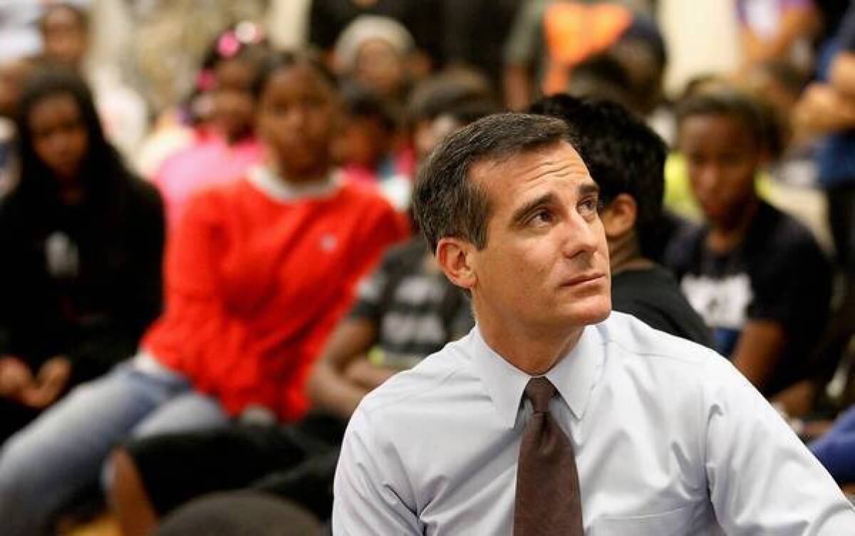 Less than a month into his term as Los Angeles mayor, Eric Garcetti faces a test of his power from a powerful union leader over a proposed labor contract.