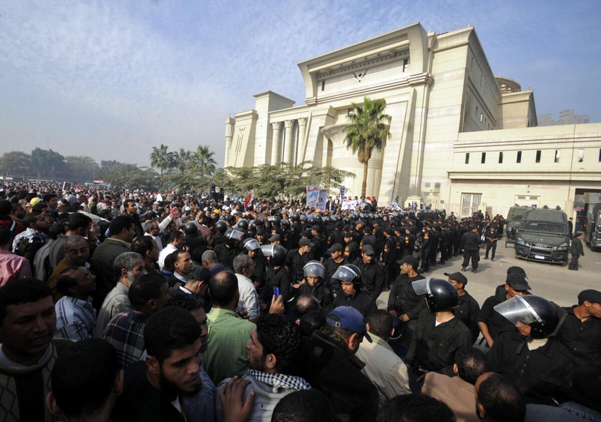 The building housing Egypt's Supreme Constitutional Court is surrounded by supporters of then-President Mohamed Morsi.
