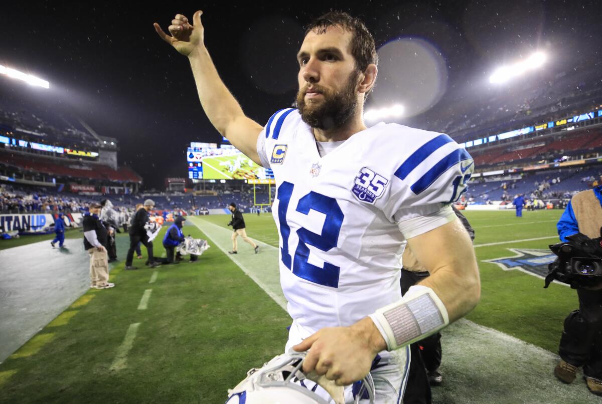 Colts quarterback gestures to the crowd after a win over the Tennessee Titans in December.