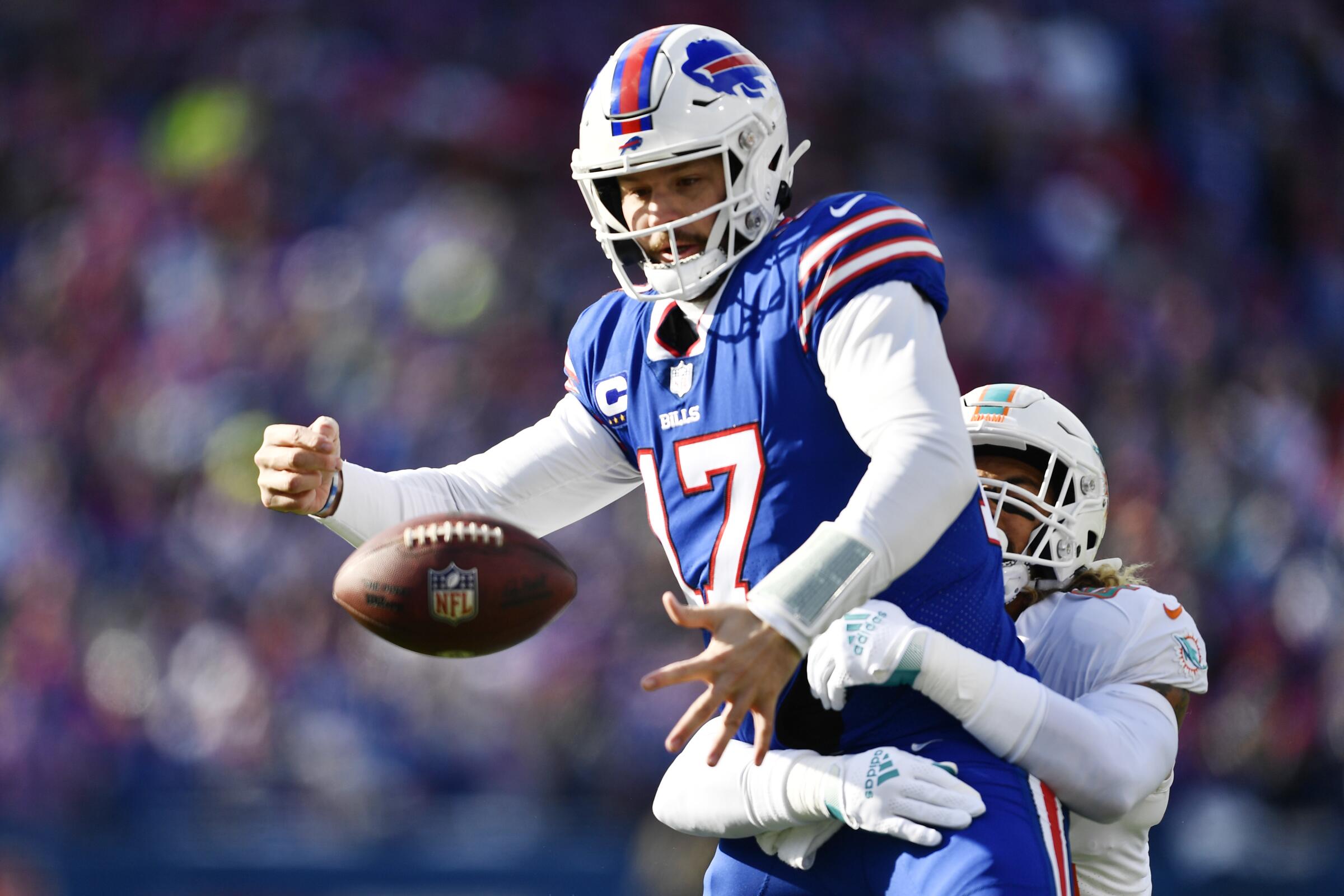 Josh Allen overcomes three turnovers in Bills' playoff win - Los Angeles  Times