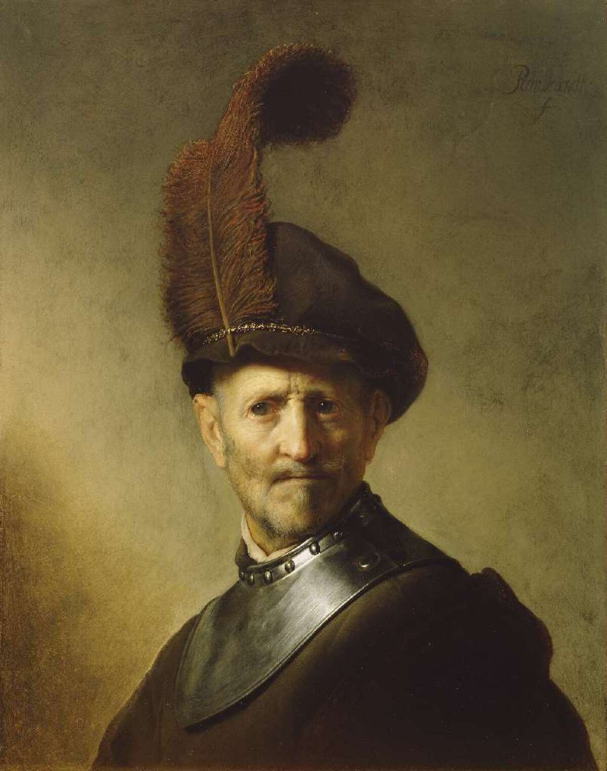 Rembrandt's "An Old Man in Military Costume" hangs at the Getty Museum, which has been trying to learn more about the portrait of a much younger man that's hidden beneath it. A new study using advanced X-ray technology gives a clearer picture of the hidden picture.