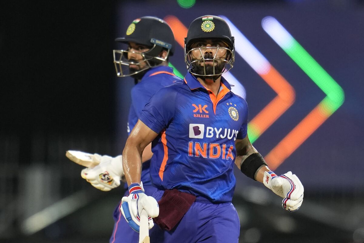 India's Virat Kohli, right, and KL Rahul run between the wickets to score during the third and last one day international cricket match between India and Australia in Chennai, India, Wednesday, March 22, 2023. (AP Photo/Aijaz Rahi)