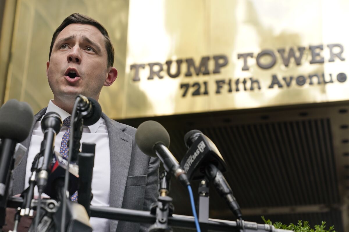 Lawyer Benjamin Dictor speaks to reporters after helping to depose former President Donald Trump in New York on Monday.