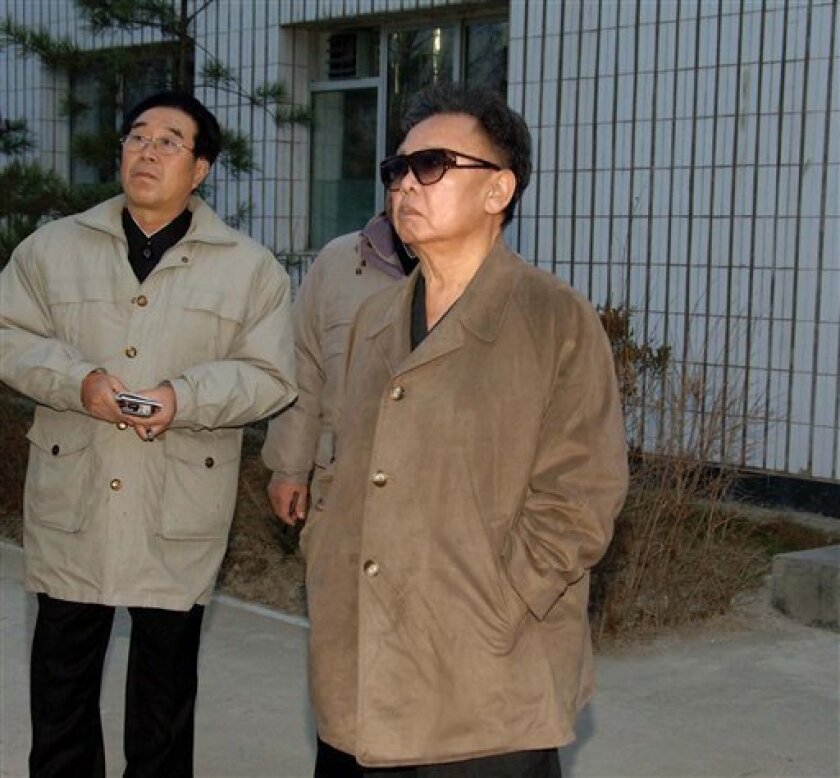 In this undated photo released on Tuesday, Nov. 25, 2008 by Korean Central News Agency via Korea News Service in Tokyo, North Korean Kim Jong Il, right, tours the Soap Shop of the Sinuiju Cosmetics factory in North Korea. North Korean state media reported that Kim visited machine and soap factories, the latest in a series of dispatches in recent weeks about public appearances by the leader believed to be recovering from a stroke. (AP Photo/Korean Central News Agency via Korea News Service)