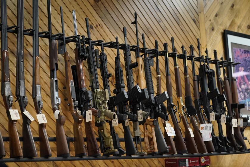 FILE - Various guns are displayed at a store in Auburn, Maine, on July 18, 2022. Court orders that prohibited two criminal defendants from possessing firearms while they awaited trial were constitutional because they were in line with past restrictions on firearms, a federal court ruled Monday, March 18, 2024. (AP Photo/Robert F. Bukaty, File)