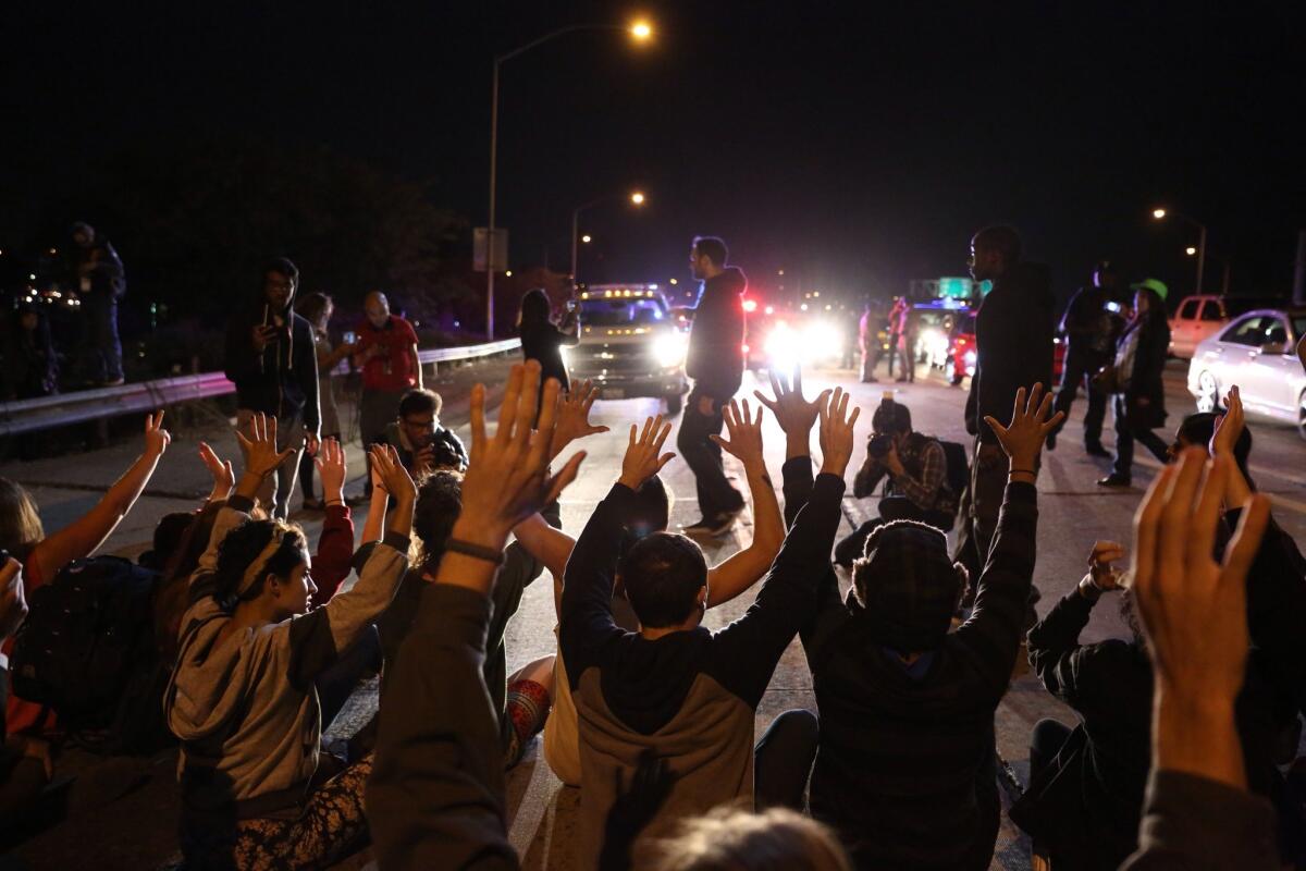 Protesters halt traffic in both directions on L.A.'s 110 Freeway near Leimert Park on Nov. 24.