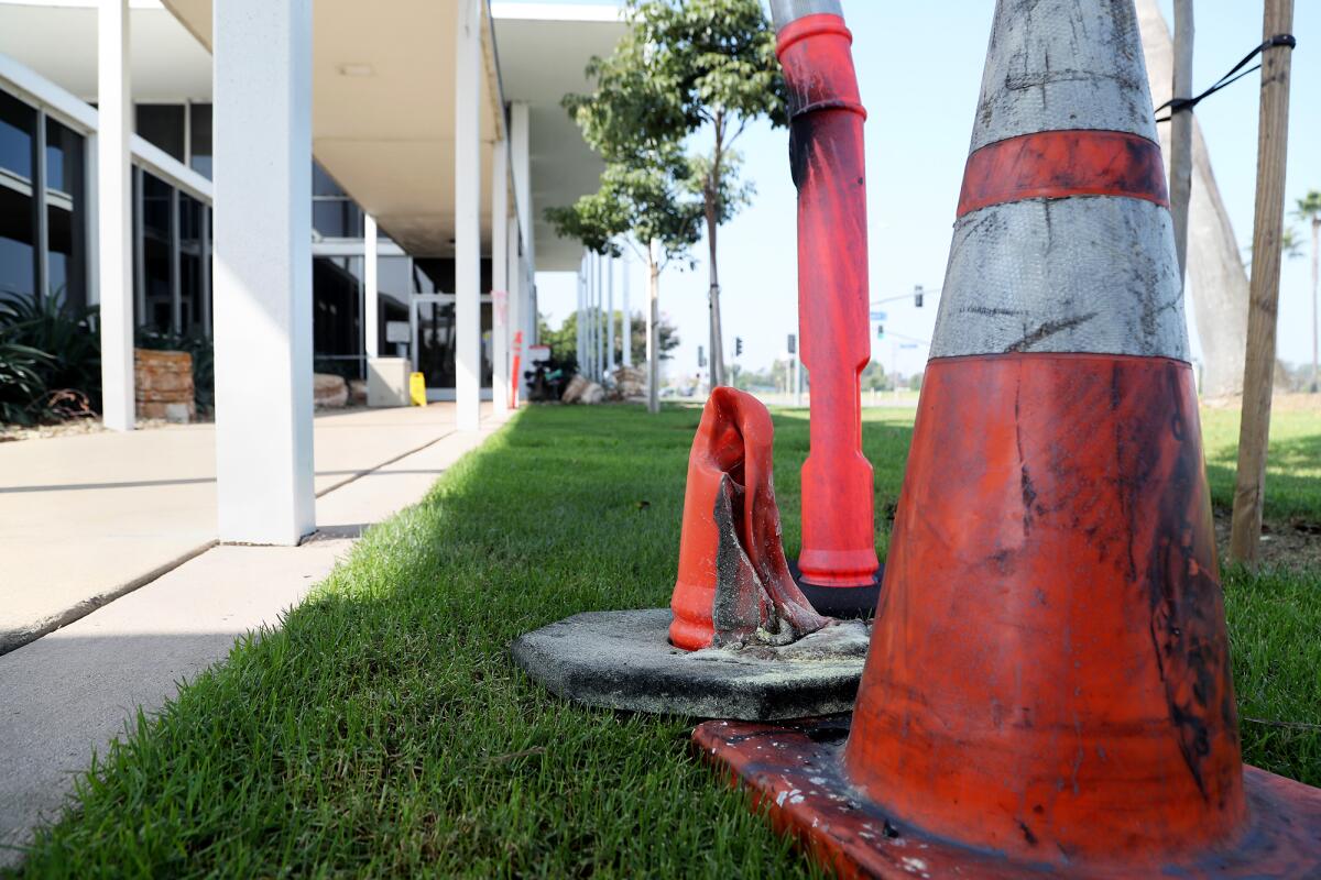 A man allegedly attempted to set a fire outside the Costa Mesa police station