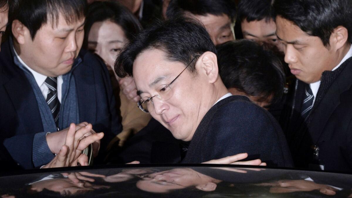 Lee Jae-yong, vice chairman of Samsung Electronics Co., gets into a car to leave after attending a hearing at the Seoul Central District Court in Seoul, South Korea, on Feb. 16, 2017.