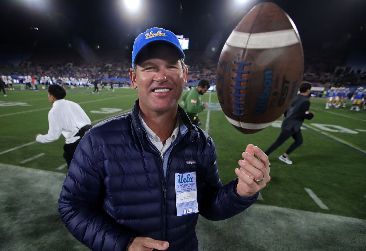 Former UCLA quarterback Cade McNown on the sideline before a game between the Bruins and Arizona.