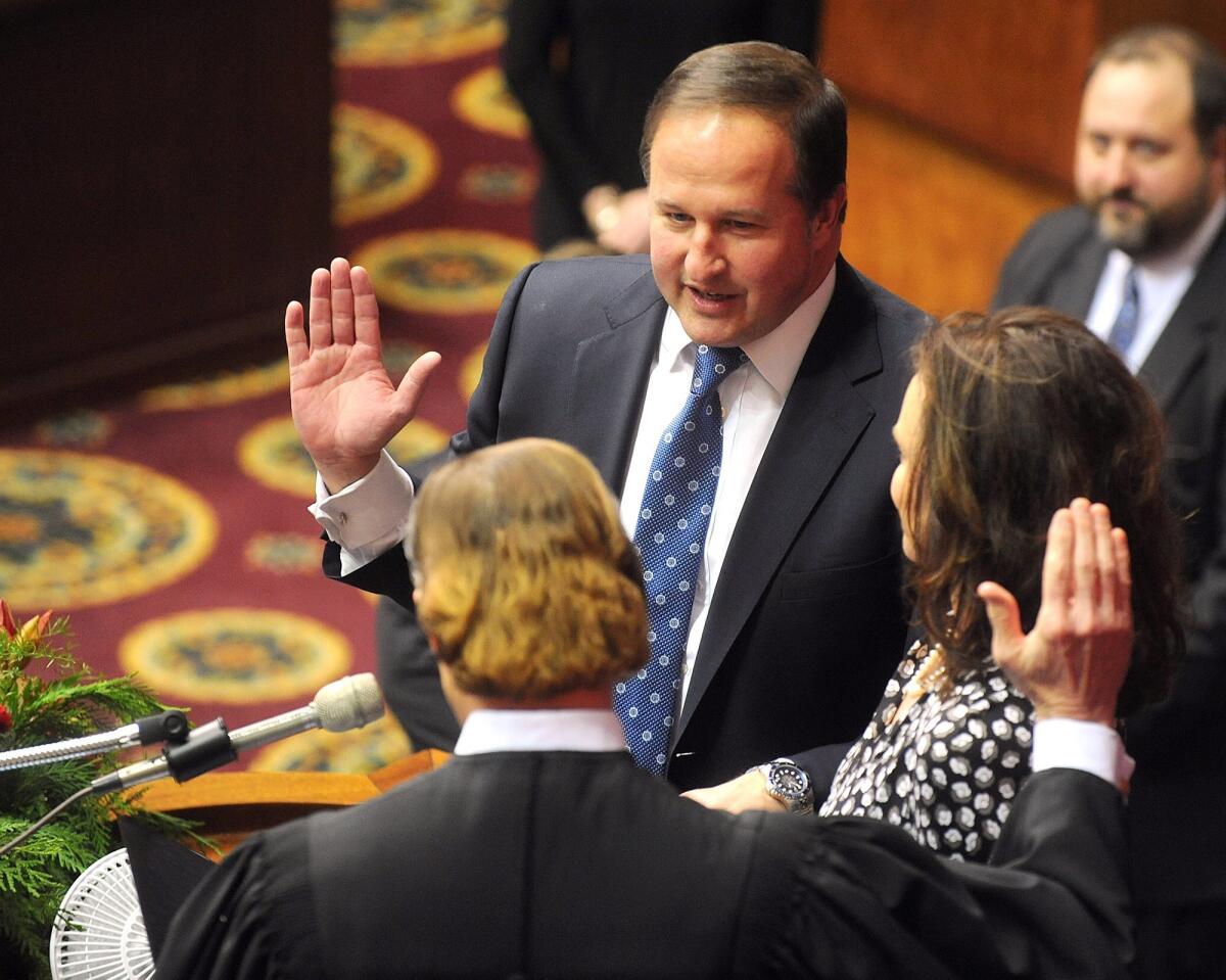 John J. Diehl Jr., center, is sworn in as the speaker of the House in January during the opening of the Missouri Legislature in Jefferson City, Mo.