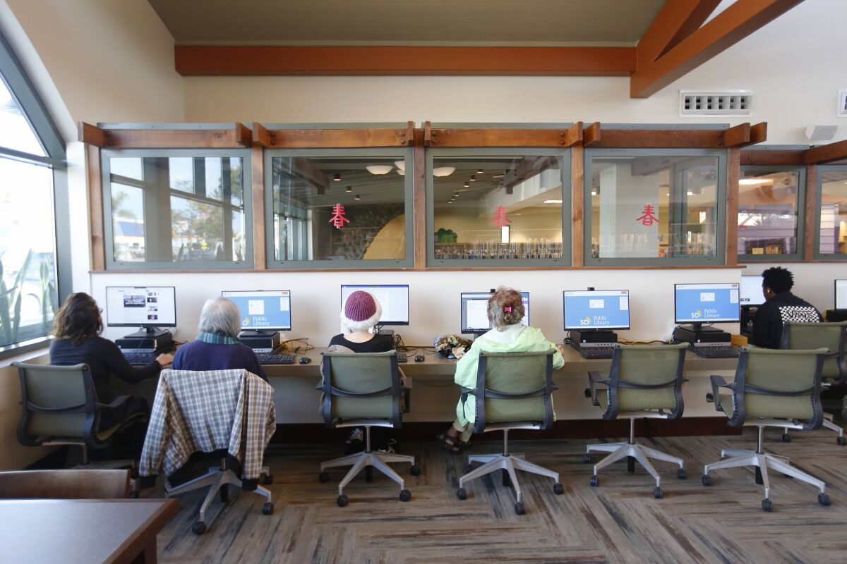 Patrons use computers at The Mission Hills-Hillcrest/Harley & Bessie Knox Library on Feb. 3, 2020. 