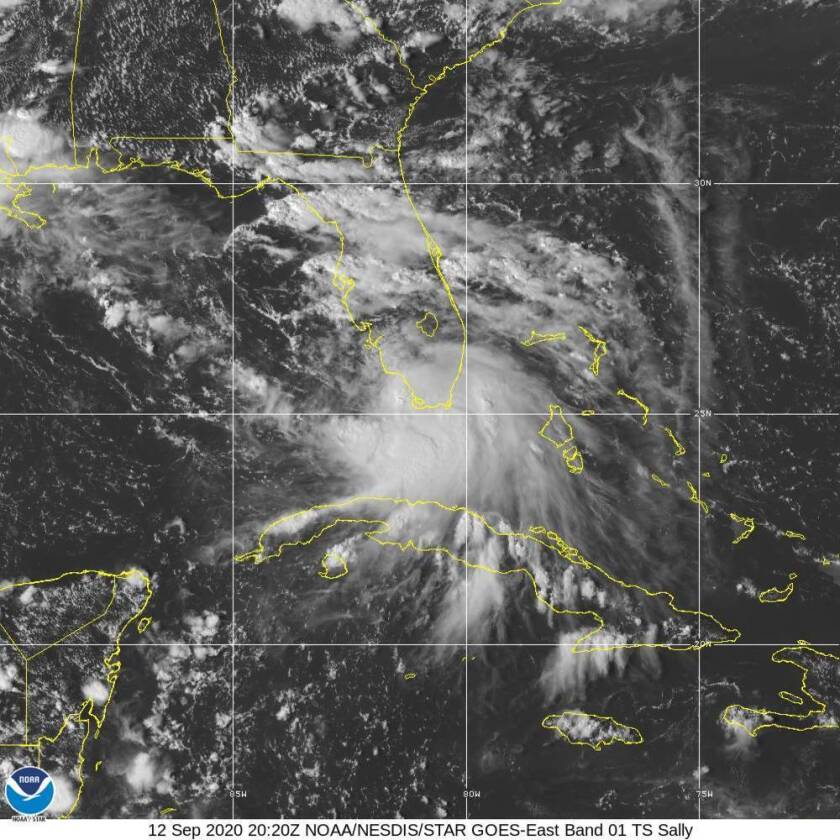 Tropical Storm Sally is seen on black-and-white satellite image above Florida and Cuba
