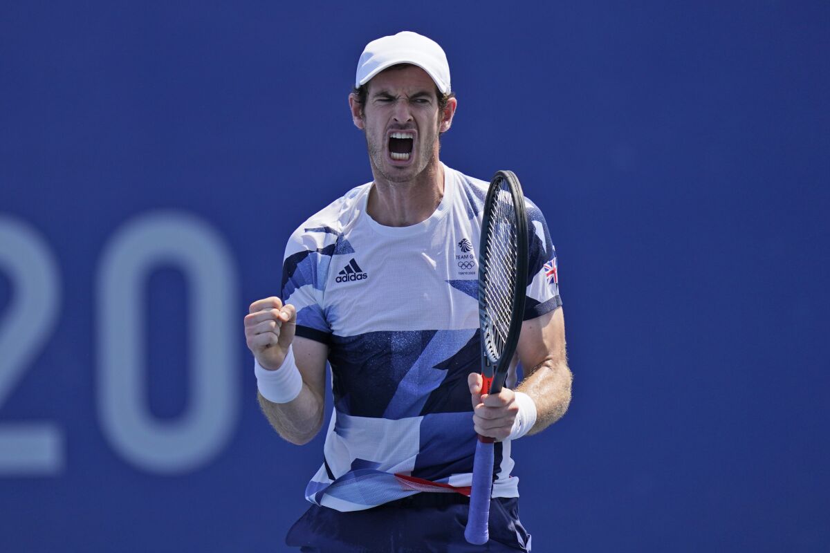 Andy Murray, of Britain, reacts after winning the first set during his doubles match in the quarterfinals of the tennis competition at the 2020 Summer Olympics, Wednesday, July 28, 2021, in Tokyo, Japan. (AP Photo/Seth Wenig)
