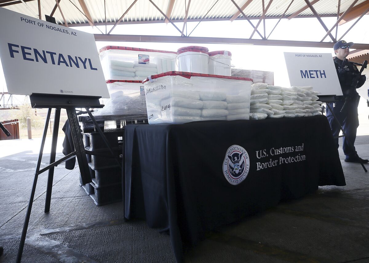 FILE -A display of the fentanyl and meth that was seized by Customs and Border Protection officers over the weekend at the Nogales Port of Entry is shown during a press conference on Thursday, Jan. 31, 2019, in Nogales, Ariz. As the number of U.S. overdose deaths continues to soar, states are trying to take steps to combat a flood of the drug that has proved the most lethal -- illicitly produced fentanyl. (Mamta Popat/Arizona Daily Star via AP, File)