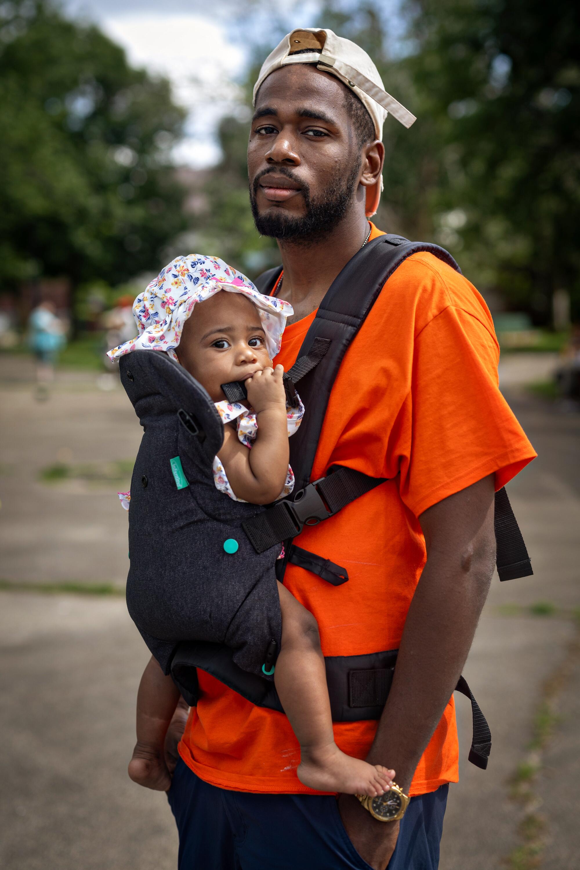 Robert Jackson and his daughter, Blessing, at the Milwaukee Childcare Collective event.