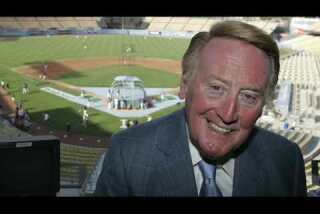 Vin Scully meets with the media before calling the Dodgers game at spring training