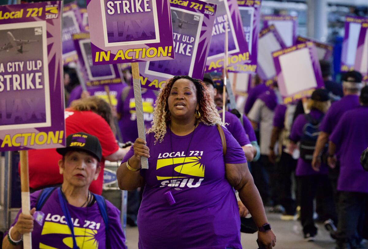 Los Angeles city workers hit the picket lines at LAX for a massive one-day strike.