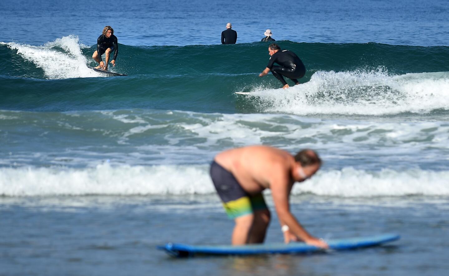 Surfers in Newport Beach