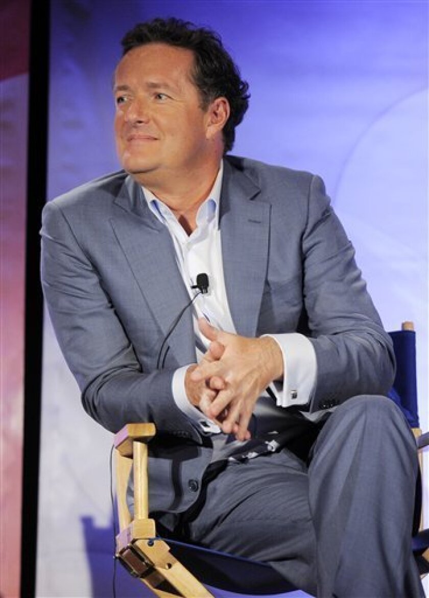 FILE - In this April 26, 2010 file photo, Piers Morgan, a judge on the NBC show "America's Got Talent," participates in a panel discussion during the NBC Universal 2010 Summer Press Day in Pasadena, Calif. (AP Photo/Chris Pizzello, file)