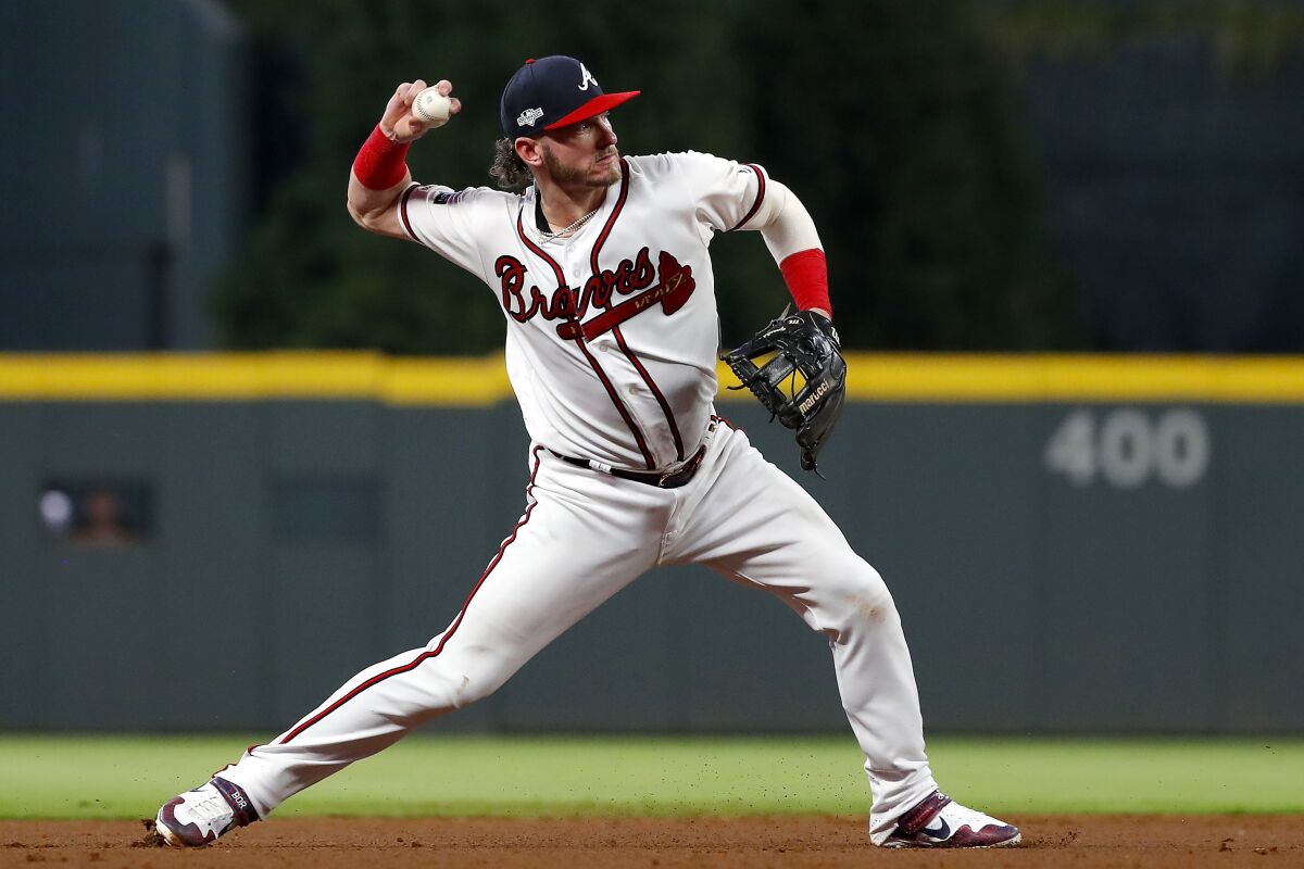 Atlanta Braves third baseman Josh Donaldson throws against the Cardinals.