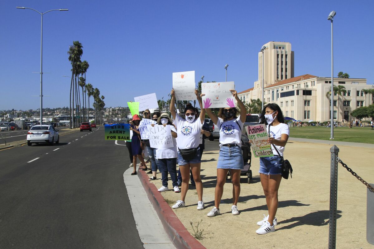 About 60 protesters gathered along Harbor Drive on Aug. 29 for the Where's Our Children rally 