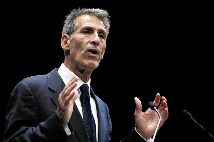 The attack on Sony computers has cast a harsh spotlight on the studio's top executives: Chairman Michael Lynton, above, and co-Chairman Amy Pascal.