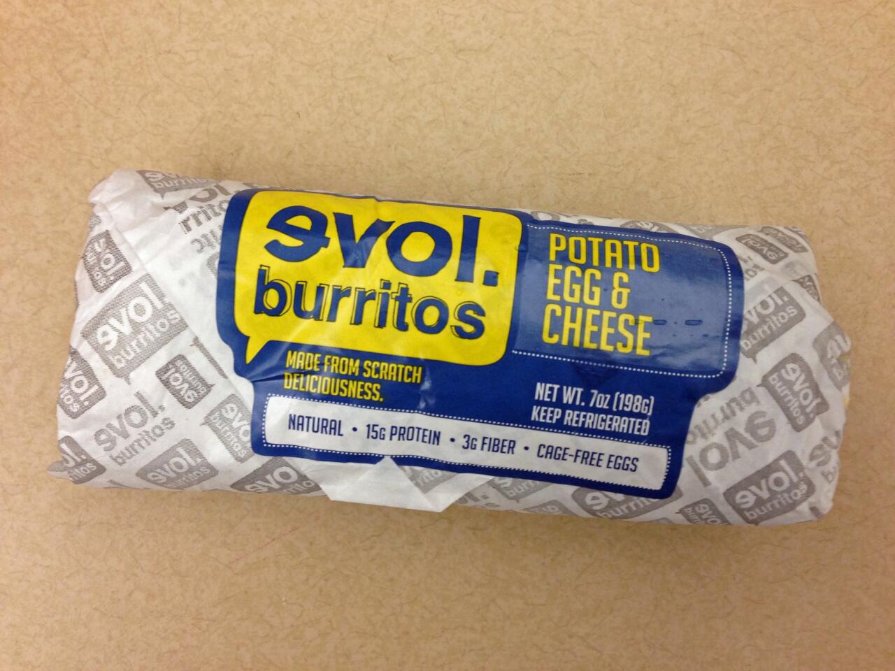 The burritos are delivered in a paper wrapper.