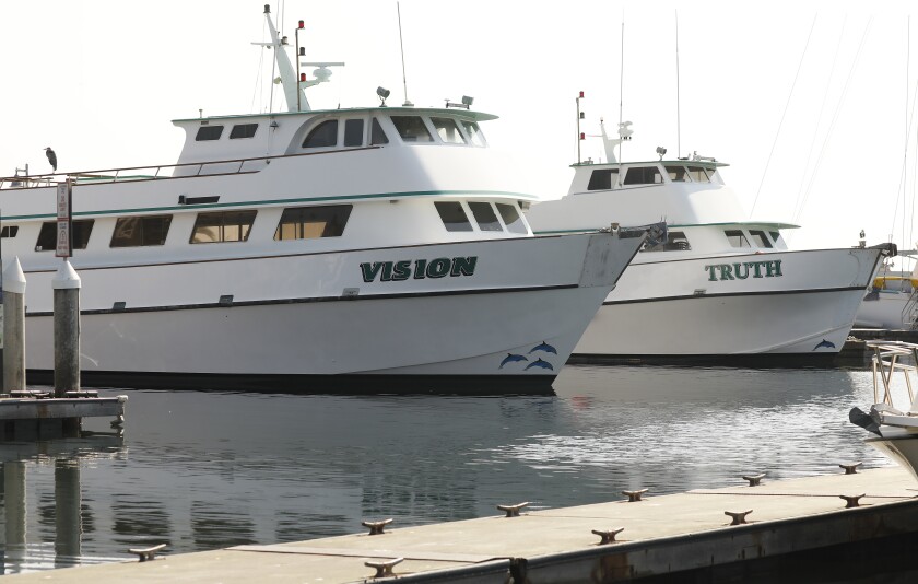 Two boats docked at the Santa Barbara Harbor