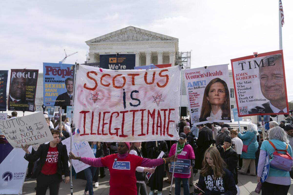 Abortion-rights activists rally outside the Supreme Court in March.
