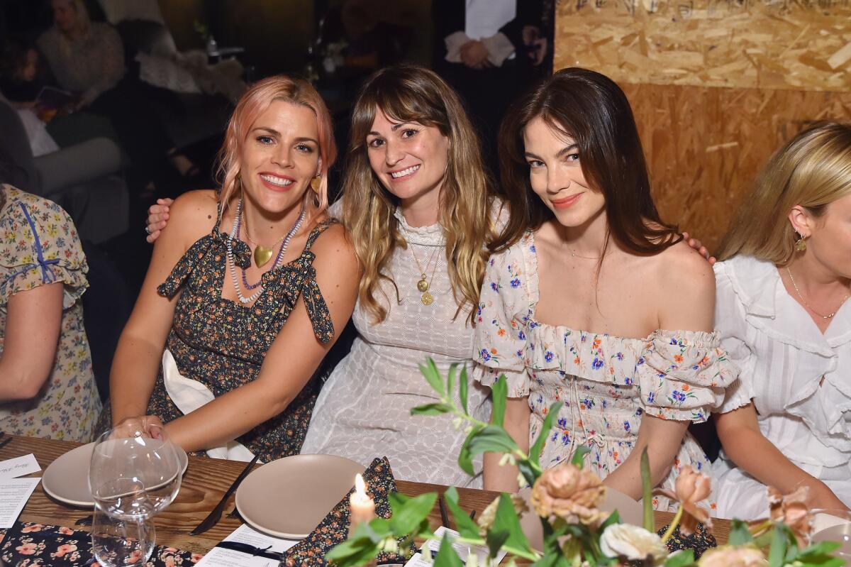 Busy Philipps, from left, Margaret Kleveland and Michelle Monaghan attend a dinner at Gjelina in Venice on Monday evening celebrating Net-a-Porter X Dôen's new capsule collection.