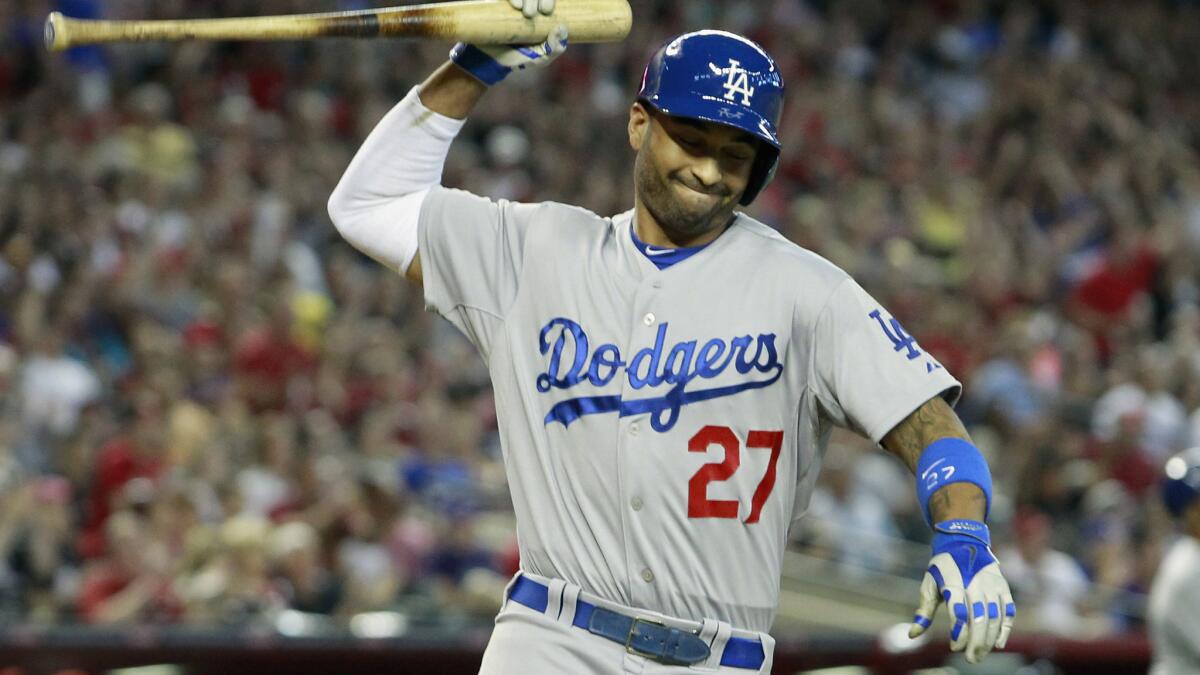 Dodgers center fielder Matt Kemp reacts after lining out with the bases loaded to end the eighth inning of the team's 5-3 loss to the Arizona Diamondbacks on Sunday.
