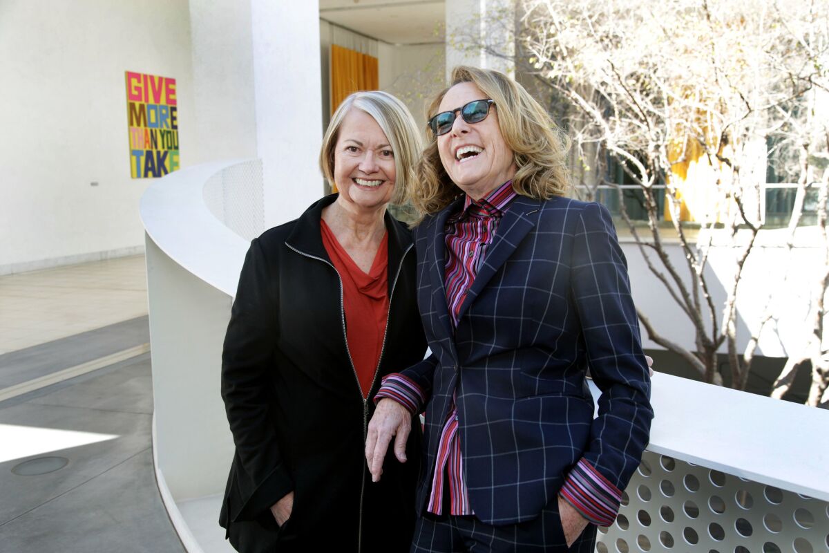 Ann Philbin, right, with Marcy Carsey at the Hammer Museum in February 2018, before the announcement of a $20 million gift from Carsey, who is chair of the Hammer's board of directors, a $30 million gift from the Resnick family and a $180 million fundraising campaign.