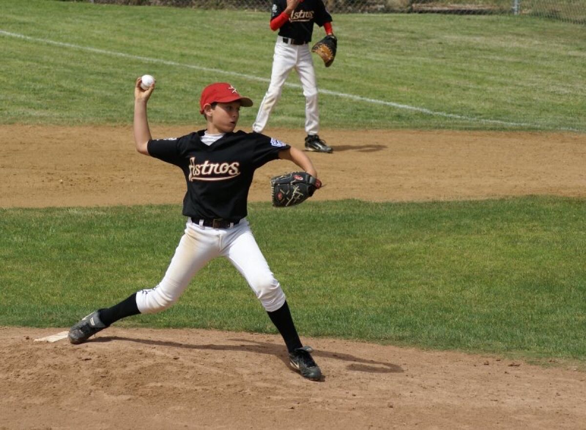 A young CJ Stubbs on the baseball field.