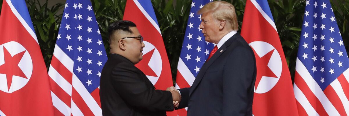 President Trump and North Korea's Kim Jong Un shake hands at their 2018 meeting in Singapore.