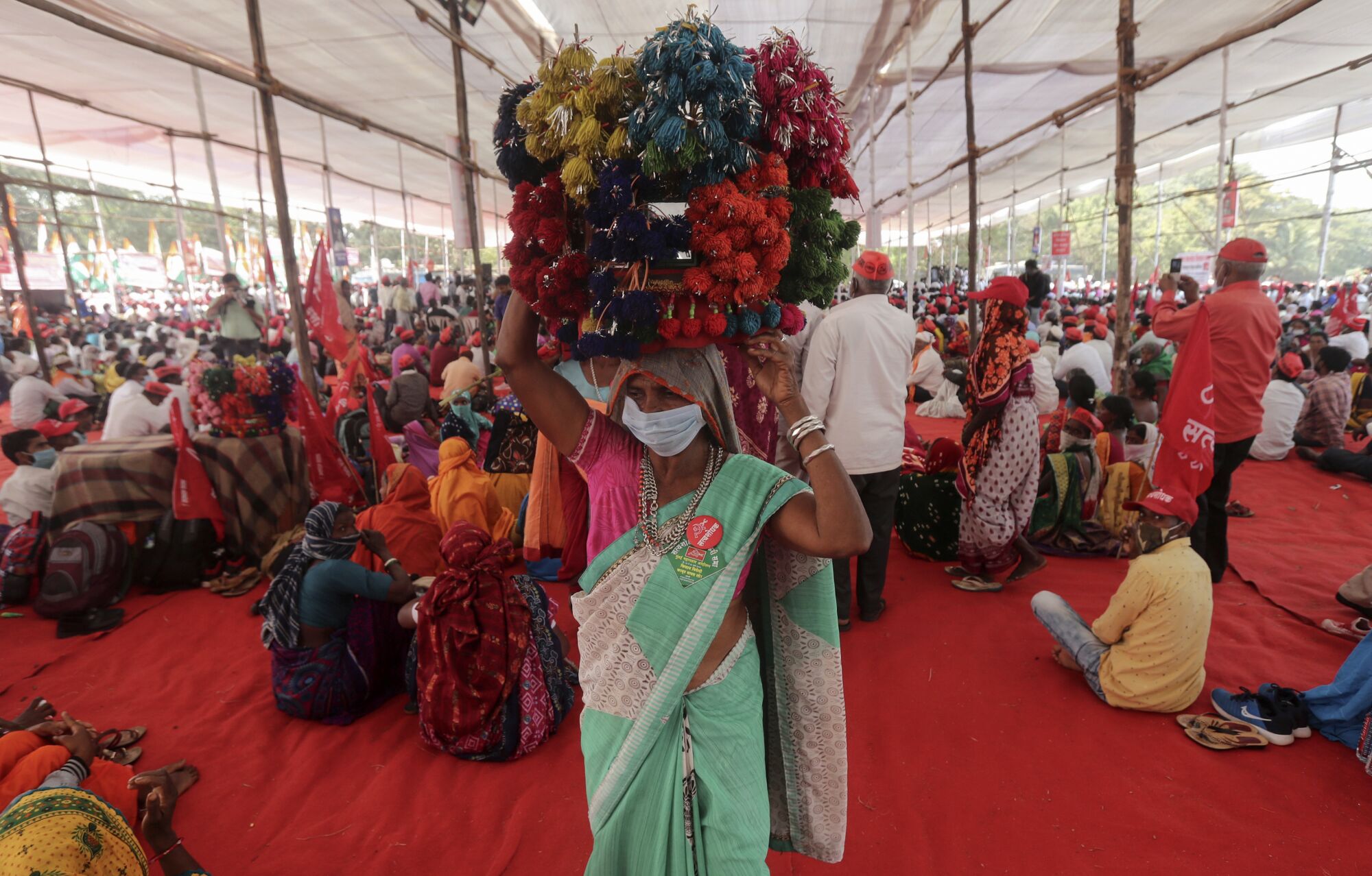 Farmers gather in Mumbai to press the Indian government to suspend contentious agricultural reform laws.
