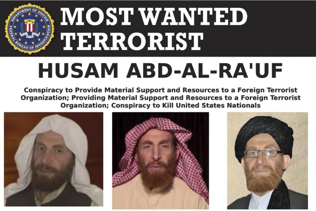 Photos of Husam Abd al-Rauf appear on an FBI most-wanted poster.