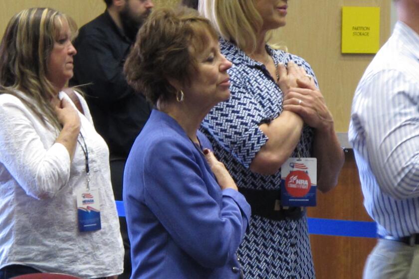 U.S. Senate candidate Sharron Angle, center, at the Nevada Republican State Convention in May 2016.