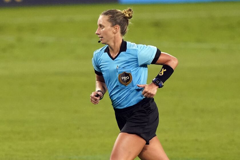Referee Tori Penso runs down the pitch during the second half of an MLS soccer match between D.C. United and Nashville SC.