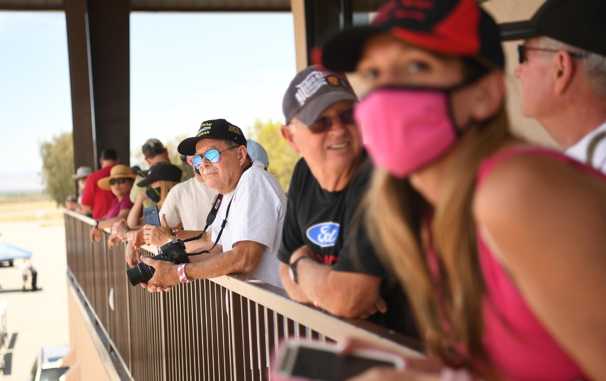 A small crowd watches during a race at Buttonwillow Raceway in Buttonwillow, Calif., on Saturday.