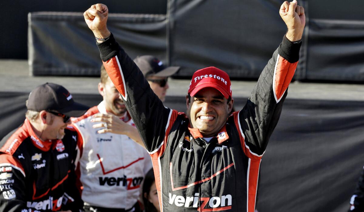 Juan Pablo Montoya celebrates after winning the IndyCar Firestone Grand Prix of St. Petersburg on Sunday.