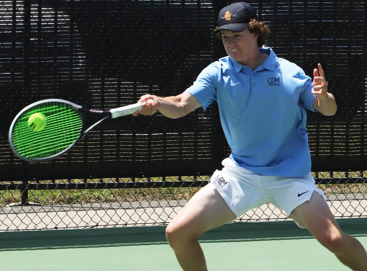 Corona del Mar's Jack Cross plays a forehand against University during Friday's Open Division title match in Claremont.
