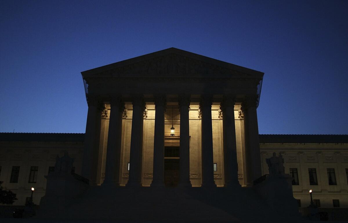 The U.S. Supreme Court is illuminated on April 25, 2012.