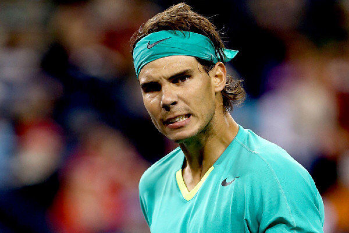 Rafael Nadal may look unhappy, but he's actually celebrating a point during his 7-6 (3), 6-2 victory over Ryan Harrison at the BNP Paribas Open on Saturday.