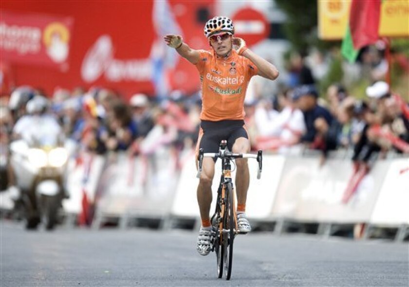 Spain's Igor Anton from Team Euskaltel Euskadi reacts, as he wins the 11th stage of La Vuelta of Spain in Pal, Andorra, Wednesday, Sept. 8, 2010. The stage was a 208,4 kilometers course from Vilanova i la Geltru to Pal in Andorra. The Vuelta ends 21 stages and 3,350 kilometers (2,081 miles) later in Madrid on Sept. 19. (AP Photo/David Ramos)