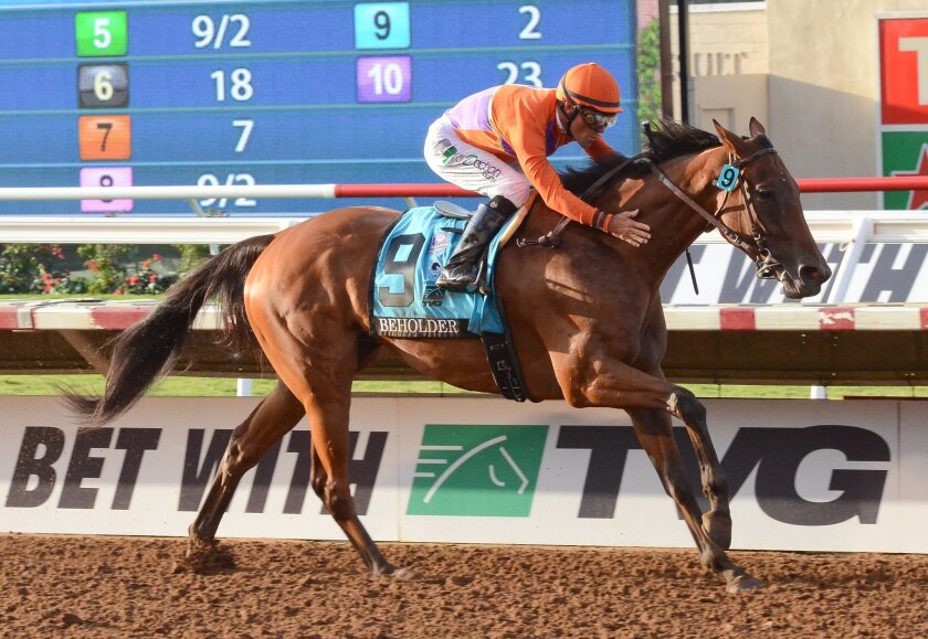 Beholder became the first female to win the Grade I, $1 million TVG Pacific Classic on Saturday. Photos by Kelley Carlson