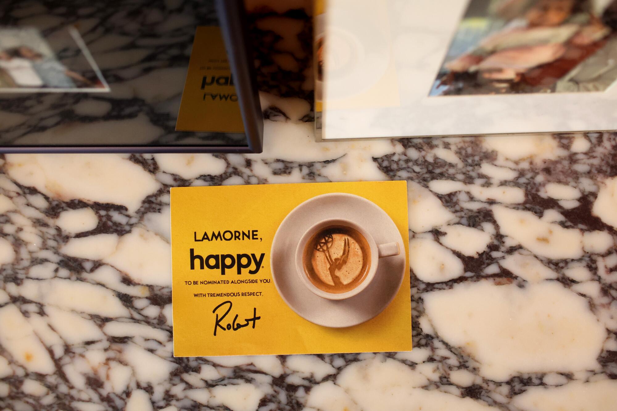 A yellow box of coffee that reads "Happy."