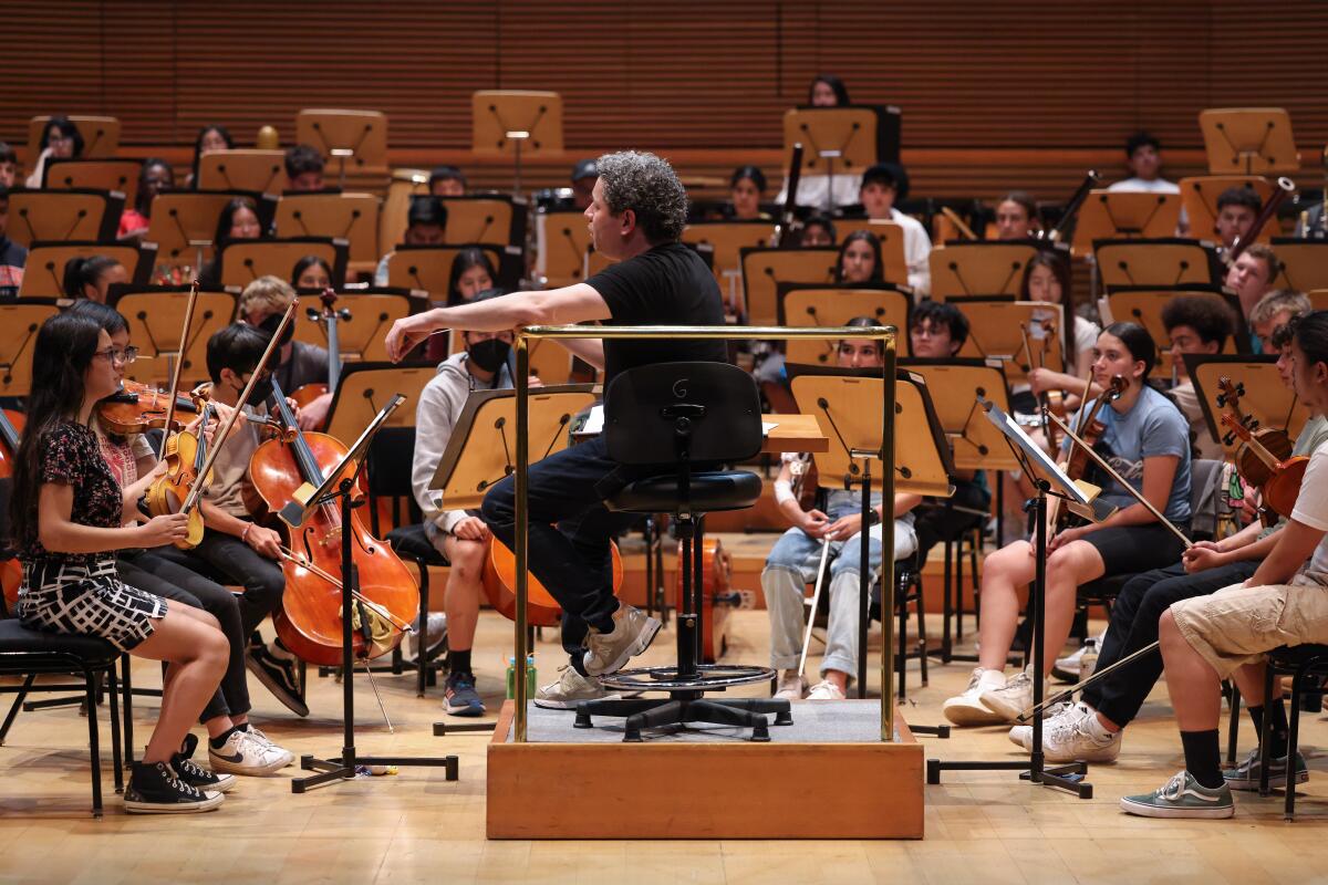 Gustavo Dudamel rehearses YOLA National Symphony Orchestra at Walt Disney Concert Hall on Friday, July 14