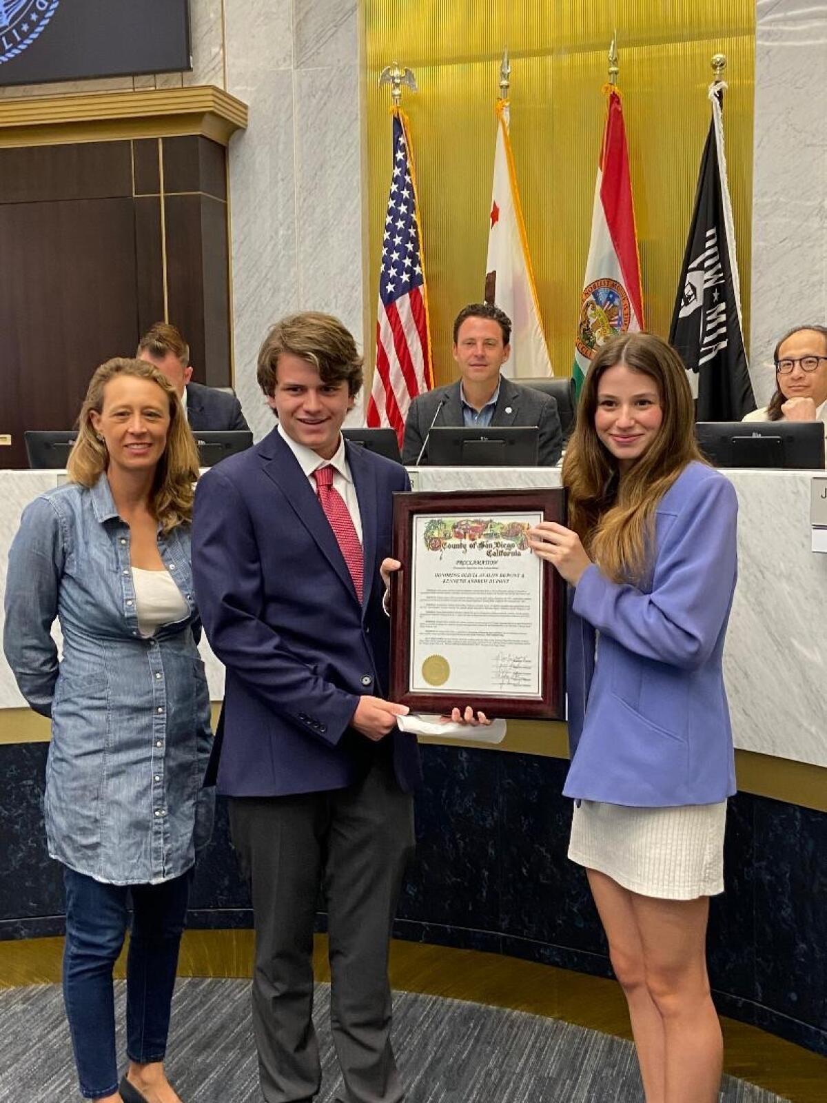 Supervisor Terra Lawson-Remer with Kenneth and Olivia Dupont.