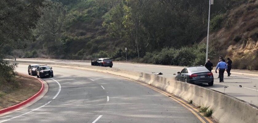 Police investigate a fatal motorcycle crash on Torrey Pines Road in La Jolla on Jan. 7.